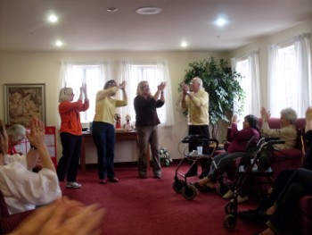 Daval Hospice Group Does a Laughter Yoga Session
